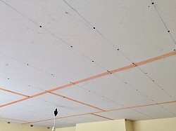 Plasterboard over existing Abestos Artex ceiling